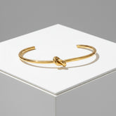 ATHENA COLLECTION - STYLISH KNOT BANGLE - GOLD