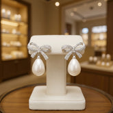 CUBIC ZIRCONIA COLLECTION - GLAM BOW EARRINGS - SILVER CZER870
