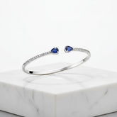 CUBIC ZIRCONIA COLLECTION - GLITZY GEM BANGLE BRACELET -CZBR144 SAPPHIRE