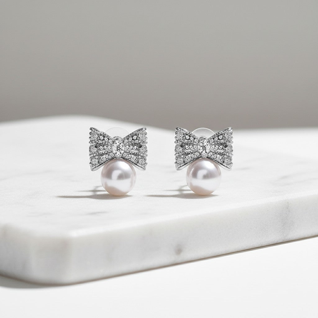 CUBIC ZIRCONIA COLLECTION - TREASURE BOW EARRINGS - CZER475