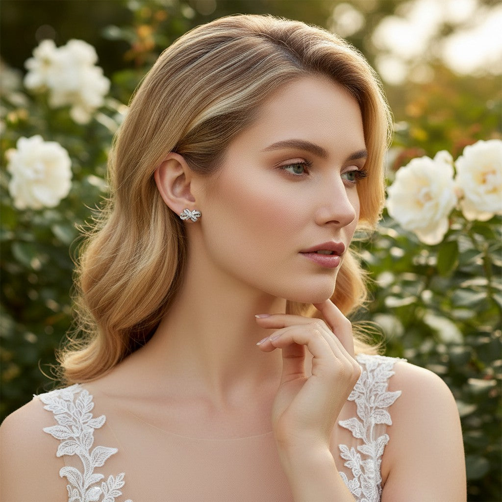 CUBIC ZIRCONIA COLLECTION - STYLISH CRYSTAL BOW EARRINGS -CZER946 SILVER